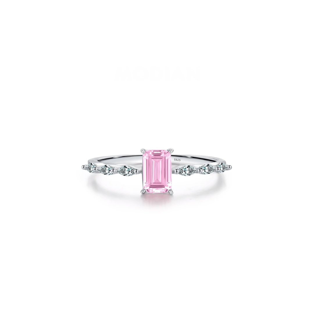 Ring with a pink gemstone on a white background