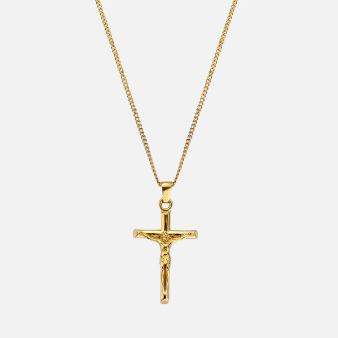 A gold-colored chain necklace featuring a cross pendant.