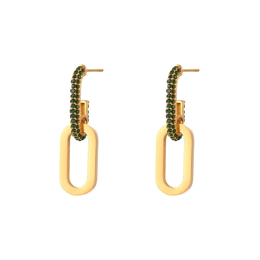 A pair of gold-colored clip earrings with a green beaded chain.
