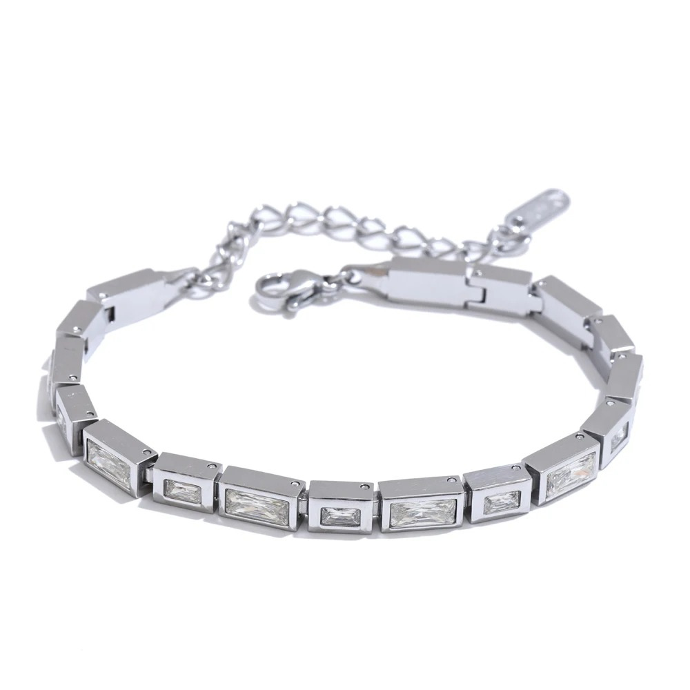 Silver bracelet with rectangular stones on a white background