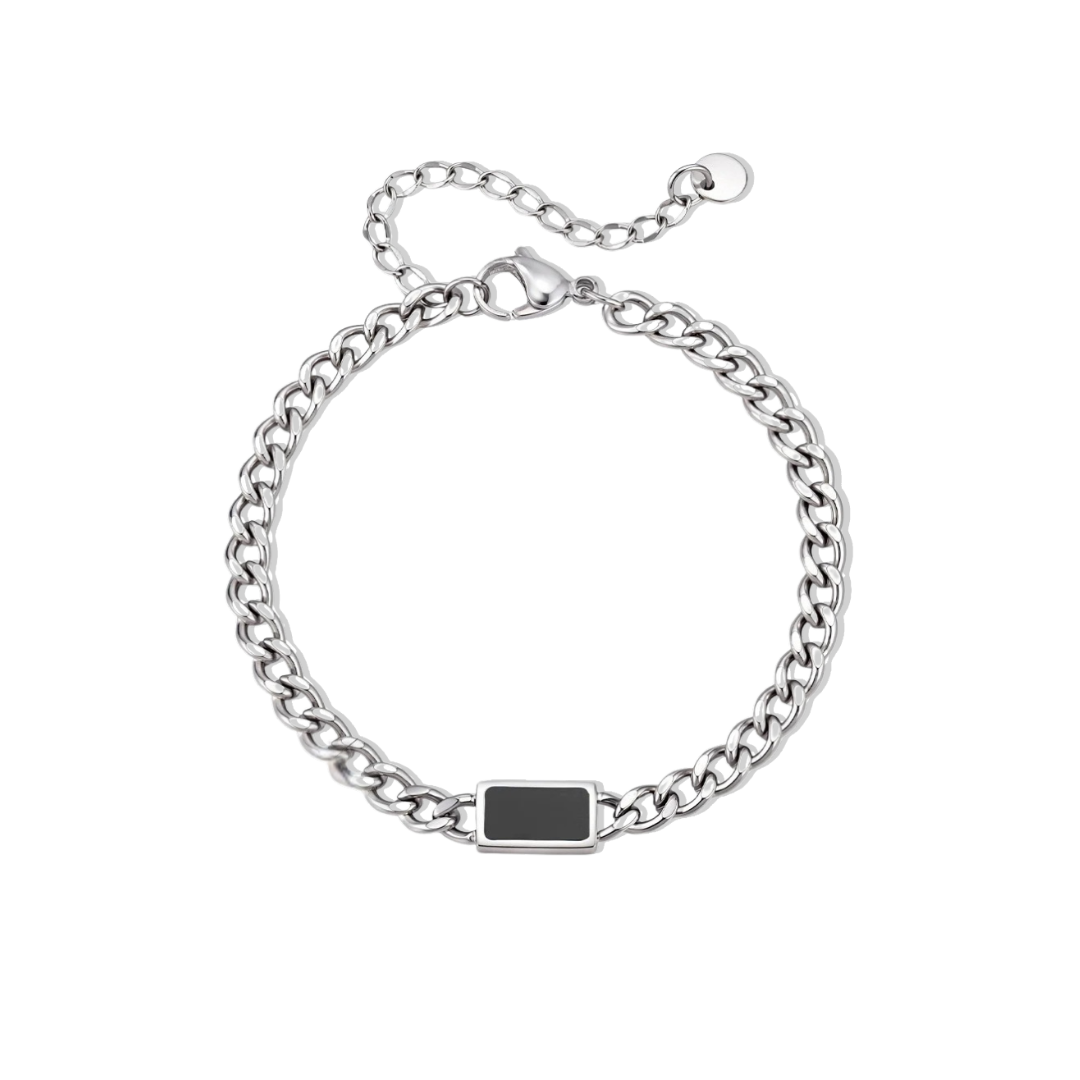 Silver chain bracelet with a black square tag on a white background